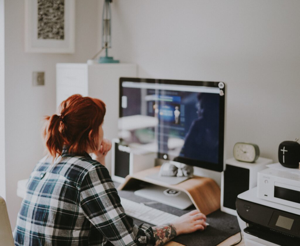 Woman working on the Computer.