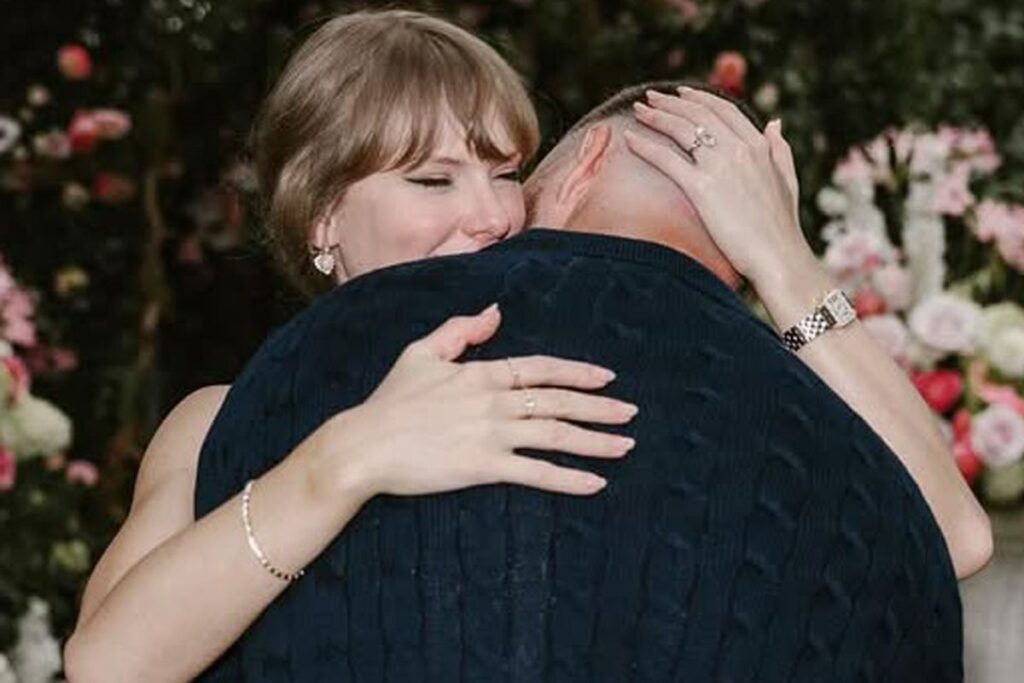 taylor switf and travis kelcey embrace after engagement